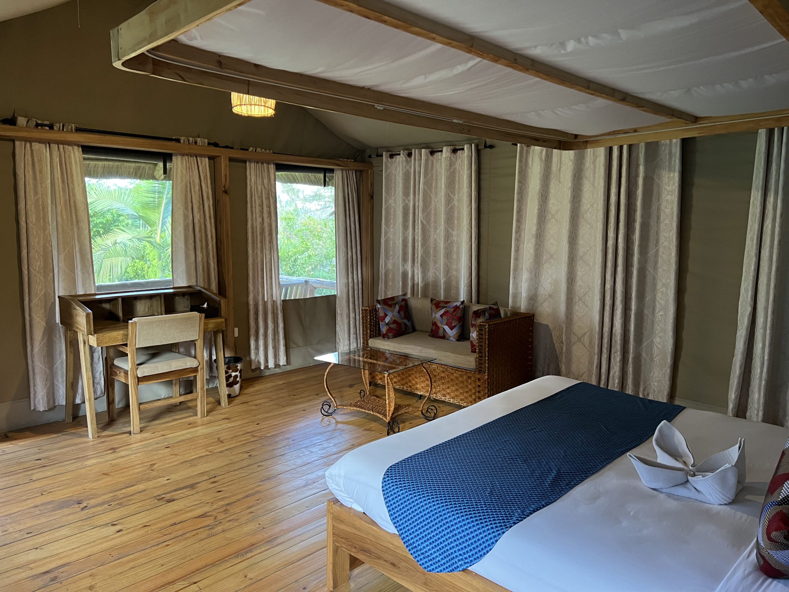 Luxury tented lodge with canvas suites on raised deck