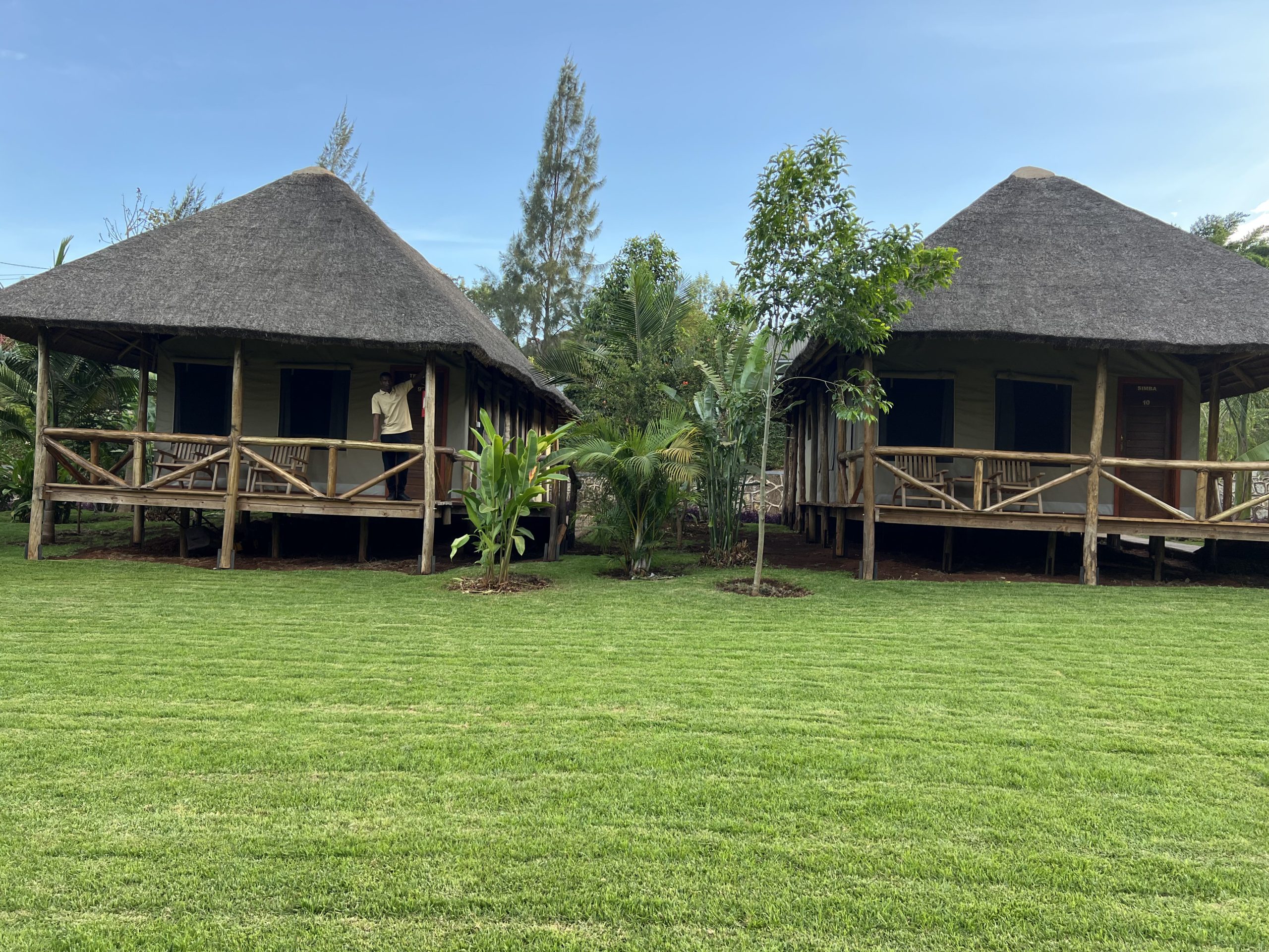 Classic tented camp with dining area and campfire under the stars